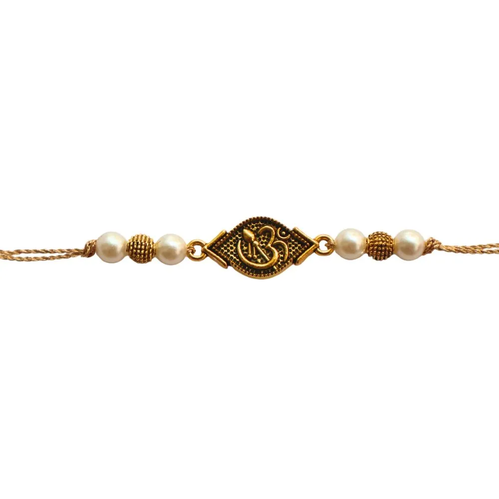 Spiritual Om Symbol Rakhi in Golden Metal